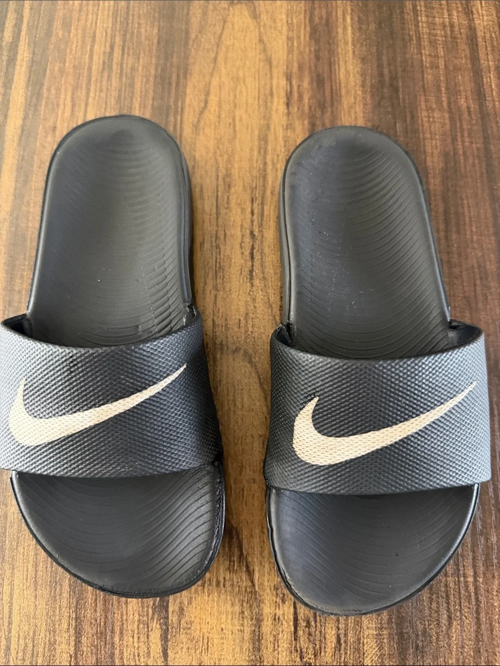 Nike Black Slide Sandals with Cream Swoosh